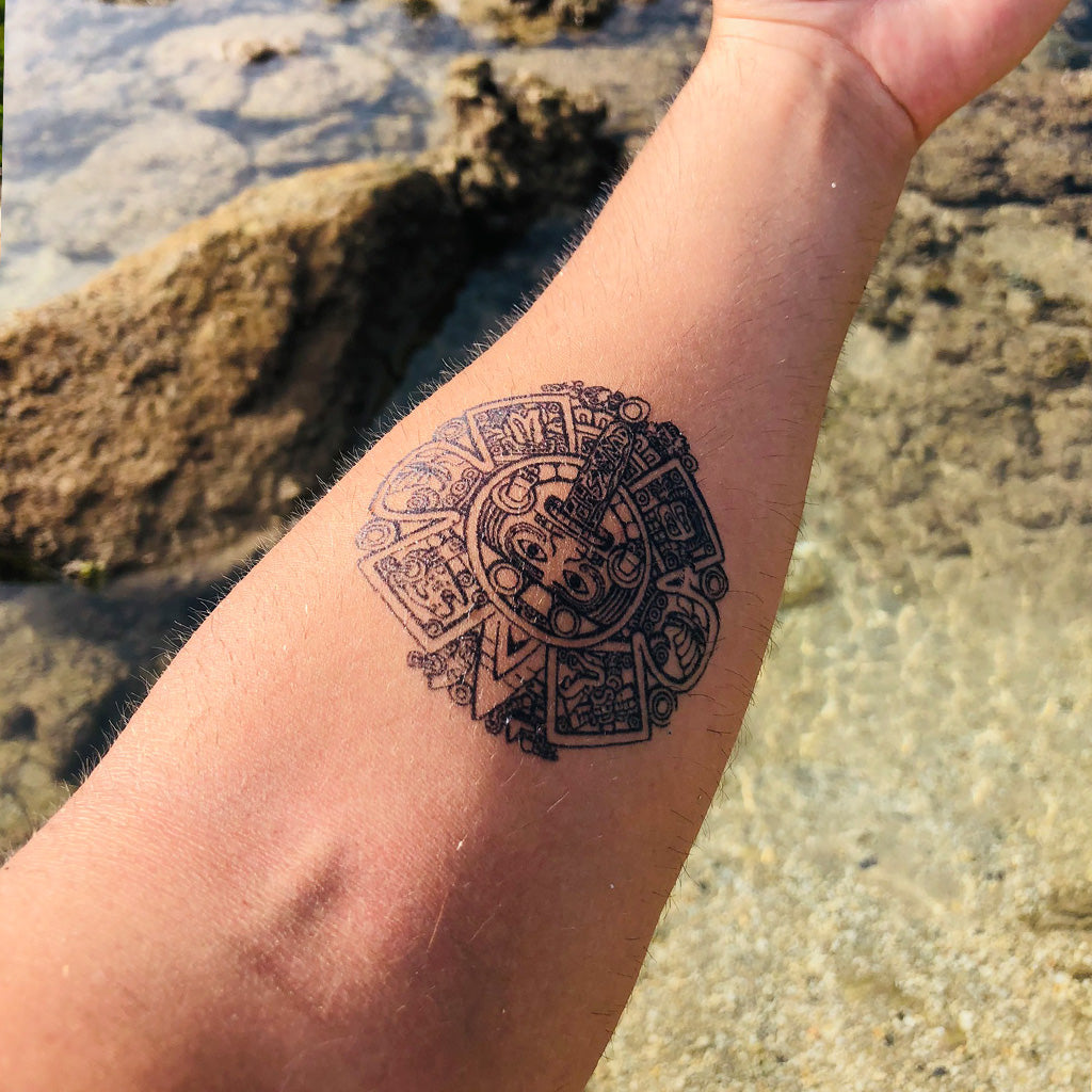 Aztec sun calendar tattoo